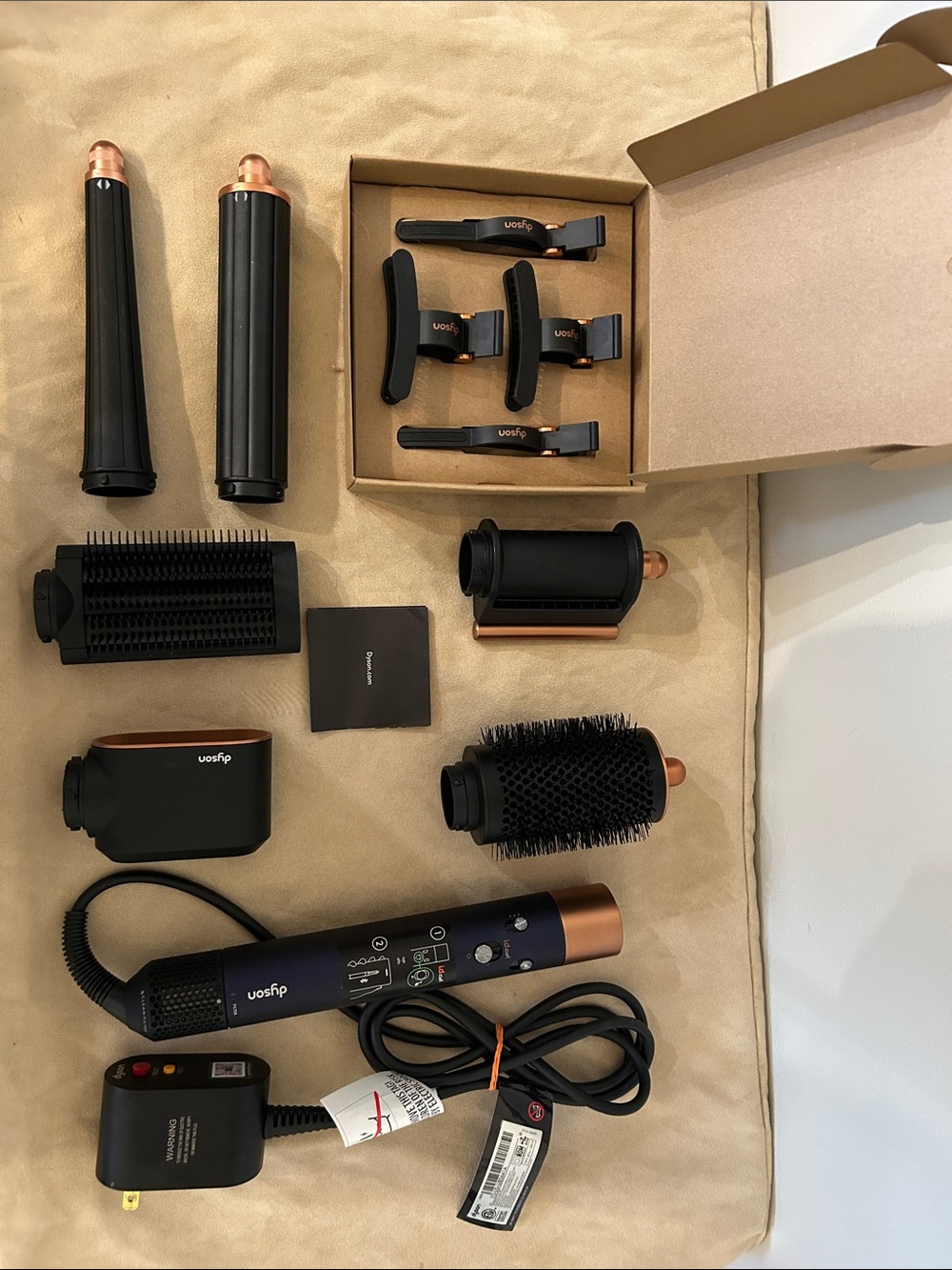 Dyson Black and Copper Airwrap Multi-Styling Set.     Used less than 5 times